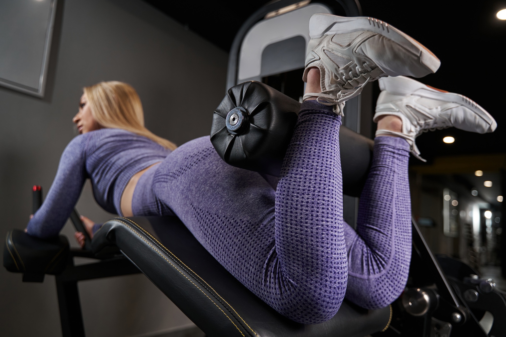 Strong lady exercising in the fitness club